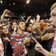 A Trump supporter (R) yells at a demonstrator (L) after Republican U.S. presidential candidate Donald Trump cancelled his rally at the University of Illinois at Chicago March 11, 2016.